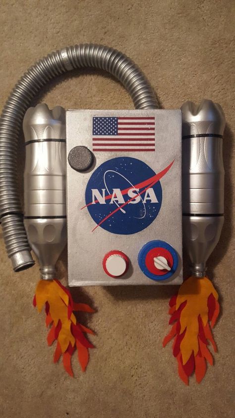 Diy Astronaut Backpack, Space Jet Pack Diy, Recycled Kids Costume, Jet Pack Costume, Jet Packs For Kids, Diy Jet Pack For Kids, Astronaut Jet Pack Diy, Costumes Made From Recycled Materials, Costume From Recycled Materials