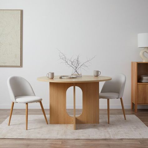 With its sleek design and Scandi aesthetic, this table is the epitome of contemporary minimalism. Measuring 120cm in diameter, it provides ample space for intimate family dinners.
The sturdy design and unique base cutout add a touch of sophistication to any modern dining area.  
Style Tip: Pair with neutral tones and decorative twigs to create a Japandi-inspired space.

#japandi #modernhome #homestyle #homeinspiration #cozyhome #interiorstyling #homegoals #interiordecor #homedetails #luxuryhomes Scandi Aesthetic, Office Storage Furniture, Contemporary Dining Table, Scandi Design, Australian Homes, Family Dinners, Modern Dining Chairs, New Living Room, Modern Spaces