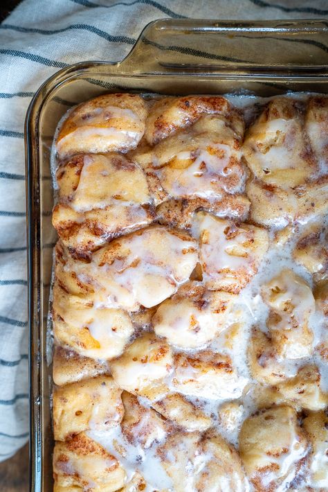 Overnight Cinnamon Roll Casserole | 12 Tomatoes Overnight Cinnamon Roll Casserole Easy, Roll Out Of Bed Bake, Night Before Cinnamon Roll Casserole, Apple Fritter Cinnamon Roll Bake, Make Ahead Crescent Roll Breakfast, Overnight Dessert Recipes, Cinnamon Roll Casserole From Scratch, Christmas Breakfast Cinnamon Rolls, Grands Cinnamon Roll Casserole