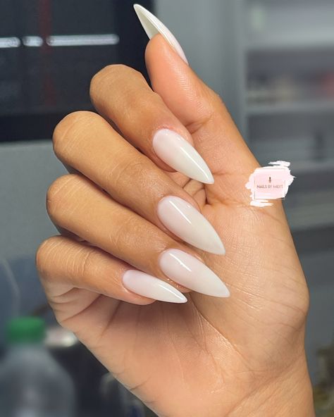 White Nails Pointy Shape, Milky White Nails Pointy, Long Milky White Almond Nails, Milky White Nails Acrylic Almond Long, Stilleto Nails Mid Length, Bubble Bath Stilleto Nails, Almond Acrylic Nails Milky White, Creamy White Almond Nails, White Nails Stiletto Long