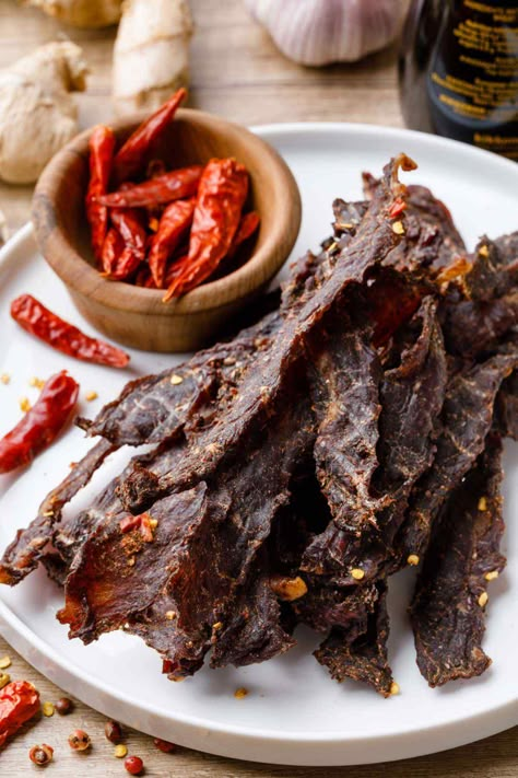 Sizchuan Beef Jerky for Spice-Lovers (Numbing and Spicy) - Healthy Substitute Spicy Beef Jerky Recipe, Ground Beef Jerky, Homemade Beef Jerky Recipe, Jerky Recipe, Making Jerky, Beef Jerky Recipes, Jerky Recipes, Beef Strips, Healthy Substitutions