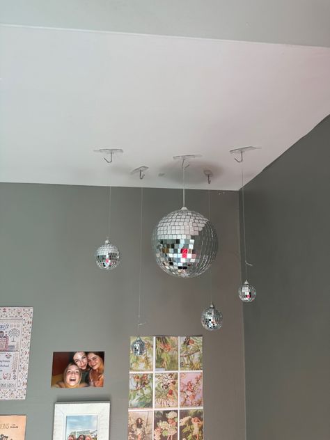 Mirrorball | disco | decor | college Disco Balls From Ceiling, Mirrorball In Bedroom, How To Hang Disco Ball From Ceiling, Disco Balls In Room, Mirror Ball Room Decor, Bedroom Disco Ball, Mirrorball Room Decor, Hanging Disco Ball Decor, Mirrorball Decor