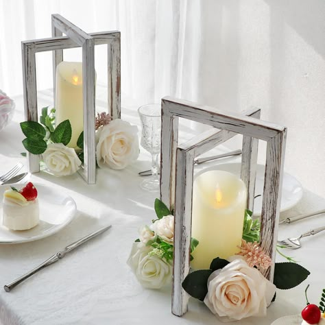 PRICES MAY VARY. 🎊Customizable: These wood candle lanterns can be customized to match your specific wedding or event theme. Add decorative accents such as flowers, greenery, or ribbon to the lanterns to personalize them and make them uniquely yours. The neutral wood finish of the lanterns allows for endless styling options, making them a versatile and customizable decor piece for any occasion. 🎊Easy to Set Up and Use: The wood centerpieces for tables come pre-assembled, so all you need to do i Candle Lanterns Wedding, Halloween Wedding Reception, Wedding Table Toppers, Wooden Candle Lanterns, Wedding Reception Tables Centerpieces, Centerpieces For Tables, Lantern Decor Wedding, Lantern Centerpiece Wedding, Rustic Wedding Table Decor