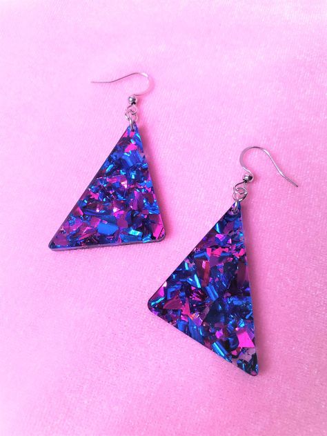 "80s Blue and Fuchsia Chunky Glitter Triangle Geometric Earrings Choice of sterling silver .925 or surgical stainless steel (These earrings pictured are made with surgical stainless steel) Approximately 1.25\" wide, and 2.5\" long from top of metal hook Rad chunky blue and fuchsia glitter earrings! Inspiration straight from the 80s, redesigned for the new retro look. These earrings are sure to sparkle, and packed full of color! This product is made to order, colors may appear slightly different Drip Aesthetics, Shein Earrings, 90s Vaporwave, 80s Accessories, Speculative Design, 80s Jewelry, 80s Earrings, Colorful Glitter, Funky Earrings