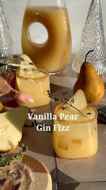 Stephanie Wahler on Instagram: "Day 3 of 12 days of Batched Cocktails 🍐

Vanilla Pear Gin Fizz (serves 8-10)

1/3 cup fresh lemon juice
3/4 cup vanilla thyme syrup (see recipe below)
3 cups pear nectar 
2 cups gin
1-2 oz sparkling water for serving 
Pear slices and thyme sprigs, for garnish

Add lemon juice, vanilla syrup, pear nectar, and gin to a pitcher. To serve pour over ice, top with sparkling water and garnish.

Vanilla Thyme Syrup-
1 cup water
1 cup sugar
2-3 sprigs of thyme
2 tbsp vanilla bean paste

Add ingredients to a saucepan over medium heat and stir till sugar dissolves, then gently simmer uncovered. Let cool and strain through a mesh strainer. 

.
.
.
.
#cocktailrecipes #easyrecipes #batchedcocktails #holidaycocktails #holidayrecipes #holidaydrinks #batcheddrinks #ginfizz Pear Cocktail Recipes, Pear Gin Fizz, Batched Cocktails, Pear Gin, Pear Cocktail, Pear Nectar, Edible Cocktails, Pear Cocktails, Vanilla Bean Paste