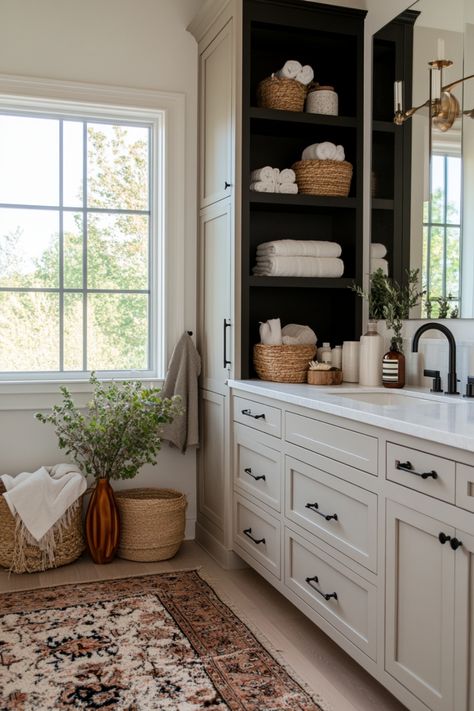 See examples of stunning black and white bathrooms that you can copy for your own home. Moody Bathroom With White Vanity, Black White Natural Bathroom, White Oak And Black Bathroom, Guest Bathroom White Cabinets, Primary Bathroom White Cabinets, Natural Bathroom Inspiration, Mix Gold And Black Hardware Bathroom, Bathroom White Cabinets Black Hardware, Oak And White Bathroom