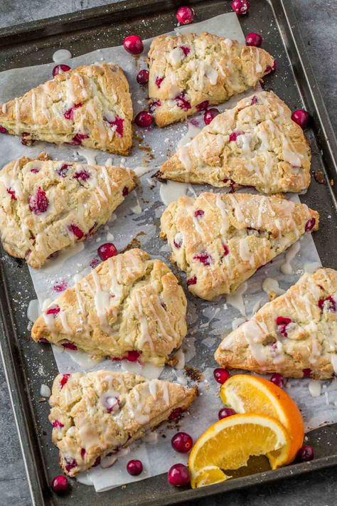 The BEST homemade flaky and sweet cranberry orange scones topped with a sweet orange sugar glaze. Cranberry Orange Scones Recipe, Orange Cranberry Scones, Orange Scones Recipe, Homemade Macarons, Cranberry Pomegranate, Easy Cranberry Sauce, Cranberry Orange Scones, Cranberry Scones, Cranberry Orange Bread