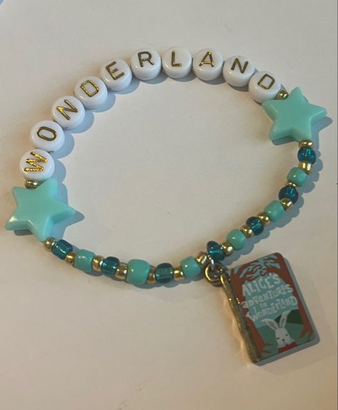 friendship bracelet
taylor swift
eras tour
the eras tour
1989
wonderland 
bracelet Book Themed Jewelry, Friendship Bracelet Tattoo, Alice In Wonderland Bracelet, Eras Bracelet, Swiftie Bracelets, Eras Bracelets, Music Bracelet, Eras Tour Taylor Swift, Bracelet Tattoo