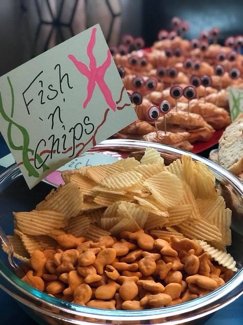 Fish and chips for Mila’s 2nd ocean themed birthday party Fish And Chips Party Food, Ocean Themes Party, Shark And Fish Birthday Party, Fishing Birthday Party Menu, Ocean Themed Brunch, Diy Sea Turtle Party Decorations, Marine Life Birthday Theme, Goldfish Themed Birthday Party, Aquatic Party Theme