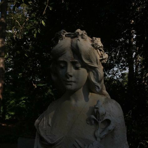 Right Hand, A Woman, Trees, Statue