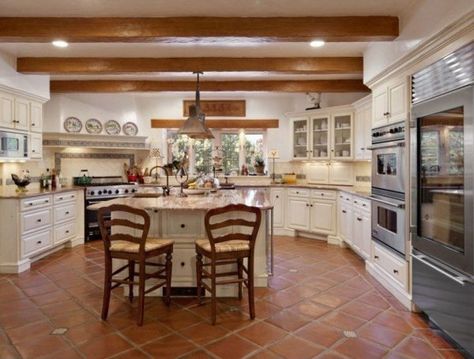 Country style kitchen with white cabinets spanish tile floors Saltillo Tile Kitchen, Spanish Tile Kitchen, Spanish Kitchen Design, Country Kitchen Backsplash, Spanish Floor Tile, Spanish Style Kitchen, Spanish Kitchen, Mediterranean Home Decor, Kitchen Cabinet Styles