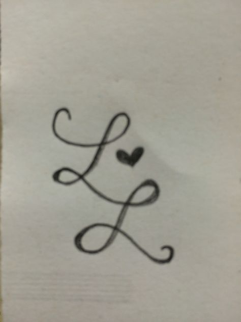 A tattoo doodle I came up with! Two cursive L's linked together with a heart. My wife and I both have names that start with "L" so I'd like to get this on either my left shoulder or below my left breast. Double L Tattoo, Cursive L Tattoo, Letter L Tattoo Ideas, L Tattoo Letter, Letter L Tattoo, Signature Inspiration, Cursive L, Best Tattoo Fonts, Cursive Tattoos