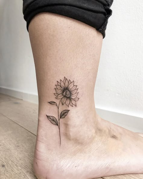 135 Sunflower Tattoo Ideas - [Best Rated Designs in 2020] - Next Luxury Sunflower On Stem Tattoo, Sunflower Tattoo With Stem, Sunflower Postage Stamp Tattoo, Whimsical Sunflower Tattoo, Sunflower Tattoo Ribcage, Cartoon Sunflower Tattoo, Sunflower Tattoo Placement, Mens Sunflower Tattoo, Sunflower Tattoo Ankle