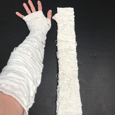 Bundle & Save On Shipping! Long Mummy Gloves White Arm Warmers Ghost Costume Covers Mens Zombie Ghoul Wrap Great For Men Or Women! Handmade In The Usa By Me! Long Light Cream White Holey/Ripped Layered Armwarmers. Over The Elbow Length. The Shredded Material Is Layered Over A Soft Knit Material. Great For Cosplays, Halloween Costumes And Gothic/Alternative Outfits! I Also Make A Shorter Version Of These And Matching Leg Warmers! Arm Warmers Are Great For: Keeping You Warm Inside And Outside. Pro Arm Warmers Men, Mummy Costume Men, Zombie Apocalypse Outfits, Zombie Outfit, Ghost Outfit, Mummy Halloween Costume, Mummy Costume, Mummy Halloween, Costume Gloves