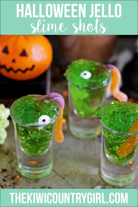 Jelly slime shots are spooky, fun, easy to make with kids for your Halloween party and delicious! Green jello, candy eyeballs and sour worms. Plus you can add vodka to make them adult party friendly! #halloween #spooky #treats #trickortreat #holidays #party #recipe #ideas #diy #jello #vodka #jelly #shots Radioactive Party, Mandarin Pumpkins, Graveyard Cups, Zombie Punch, Monster Popcorn, Halloween Beverages, Vodka Jelly, Halloween Jelly, Halloween Jello Shots