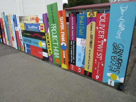 Ahipara fence of book spines Spine Wallpaper, Book Mural, Library Mural, School Library Book Displays, Spine Poetry, School Library Decor, School Library Design, Book Spines, Library Book Displays