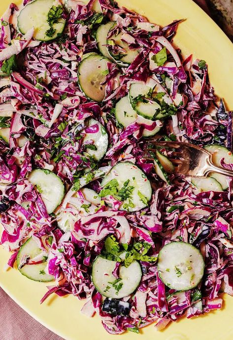 This cucumber cabbage slaw is tangy, sweet, and just a little spicy. It's the perfect accompaniment to tacos, grilled chicken, or piled on a burrito bowl. The post Cucumber Cabbage Slaw appeared first on Tried and True Recipes. Spicy Cabbage Slaw, Spicy Cabbage Salad Recipes, Middle Eastern Cabbage Salad, Cava Cabbage Slaw, Cabbage And Fennel Slaw, Slaw Dressing, Types Of Salad, Persian Cucumber, Cucumber Recipes Salad