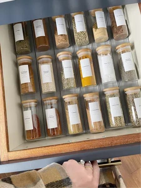 KITCHEN / Looking to organize your kitchen? Here is my favorite and gorgeous way to organize your spices that is easy to access and practical. | SBK Living Spice Cabinet Organization, Spice Organization Drawer, Spice Organizers, Spice Drawer, House Organisation, Spice Rack Organiser, Glass Spice Jars, Kitchen Organisation, Spice Labels