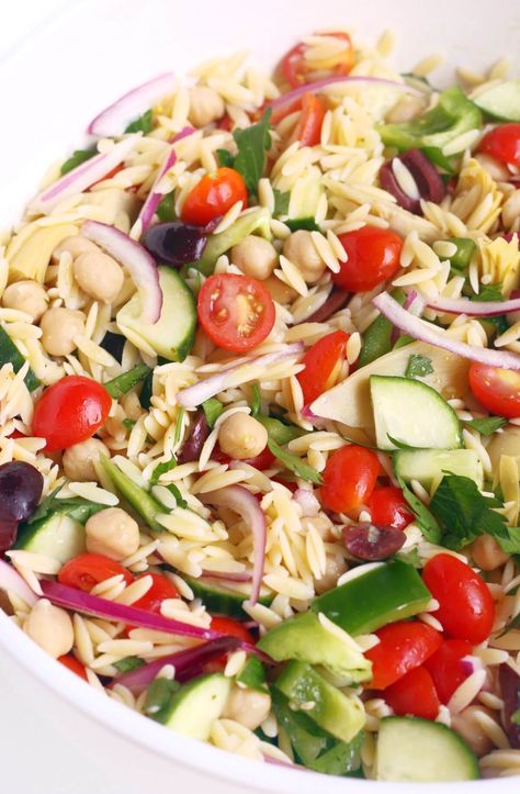 Orzo Pasta Salad (Gluten-Free, Vegan) | Strength and Sunshine | This cold Orzo Pasta Salad recipe is gluten-free, vegan, and allergy-free! This Greek-inspired orzo pasta salad is packed with fresh crisp veggies, kalamata olives, artichokes, chickpeas, and tender orzo, tossed with simple homemade vinaigrette! A healthy Mediterranean side dish that's easy and quick to whip up for potlucks, cookouts, and light meal prep lunches for the week! Vegan Orzo Salad, Light Meal Prep, Cold Orzo Pasta Salad, Vegan Pasta Salads, Orzo Recipes Healthy, Fluff Salads, Orzo Pasta Salad Recipe, Gluten Free Orzo, Lunches For The Week