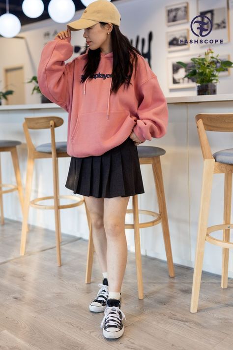 Millennial brunette girl wearing trendy fashionable casual clothing pink color hoodie and black mini skirt Mini Skirt And Hoodie Outfit, Casual Outfits For Wedding, Hoodie Skirt Outfits, Hoodie And Skirt Outfits, Casual Outfits For Plus Size, Hoodie With Skirt, Casual Outfits For Guys, Casual Outfits For Ladies, Cool Casual Outfits