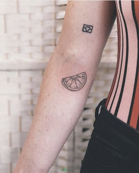 Orange slice tattoo Tattoos Of Oranges, Tangerine Slice Tattoo, Simple Orange Slice Tattoo, Orange Slice Tattoo Traditional, Orange Fruit Tattoo Black And White, Orange Half Tattoo, Tattoo Of An Orange, Tattoo Of Orange, Orange Line Tattoo