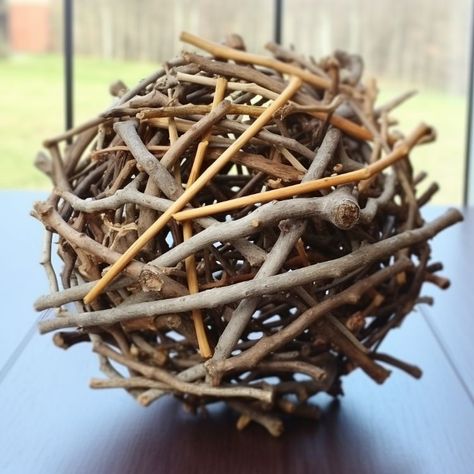 Collect some twigs from outside and make these 8 pretty DIYs Twig Balls Diy, Twig Birdhouse Diy, Crafts With Branches And Twigs, Diy Twigs And Branches Decor, Twig Baskets Diy, Twigs And Branches Decor, Twig Art Diy Tree Branches, Wooden Stick Crafts, Yarn Sticks