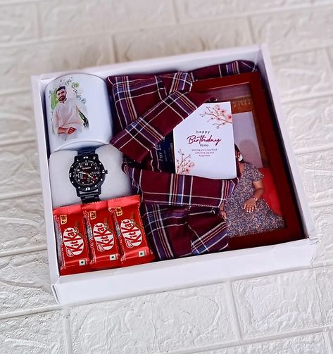 Shirt Hamper ✨❤️ Includes: Shirt Watch Chocolates/ Flowers Photo Frame Photo Mug Wish card DM for Orders @crafting_with_zana All India Delivery Available ✅ Birthday box | Birthday hamper | Customised gifts #birthdaygift#customization#reelskeralagram#photochocolate#photomug#customizedgifts#birthdayhamperbox#fyp Watch Hamper, Shirt Hamper, Birthday Hamper, Hamper Box, Chocolate Hampers, Birthday Hampers, Hamper Boxes, Wish Card, Customised Gifts