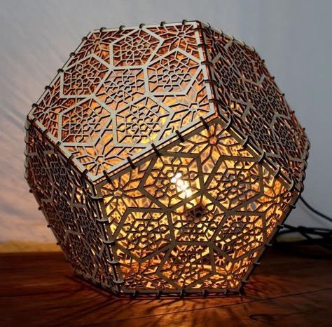 Dodecahedron lamp made using a laser cutter. (Hanging or desk lamp)Made using Fusion 360Source file: http://a360.co/2pf1MleRequired materials: Wood glue or glue... Laser Cut Lamps, Yoga Studio Design, Laser Cut Box, Project Table, Woodworking Tools Workshop, Diy Lampe, Laser Cnc, 3d Modelle, 3d Laser