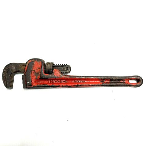 RIGID Vintage Pipe Wrench 14" THE RIGID TOOL CO ELYRIA, OHIO USA  Plumbing Tool This is as seen in the photos, please read the complete listing and look at the carefully taken photos. Also, please send messages for questions and concerns, we will attend to you ASAP. Thanks and please be safe! ITEM LCN: grg shf 2