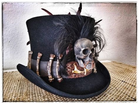 Commissioned Voodoo top hat with stitched leather, and faux aligator hat band, veve bones, Red/Black rooster feathers, and skull. Shop etsy Ghostfire68 Pixie Parasol, Voodoo Fashion, Voodoo Top Hat, Witch Doctor Costume, Skull Top Hat, Voodoo Costume, Voodoo Halloween, Voodoo Art, Papa Legba