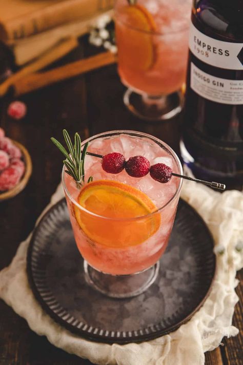 Easy Cranberry Gin Fizz Cocktail  | Healthy Little Peach Cocktails With Cranberry Juice, Cranberry Gin Fizz, Ginger Beer Cocktail, Unsweetened Cranberry Juice, Gin Fizz Cocktail, Thanksgiving Cocktail, Candied Cranberries, Fizz Cocktail, Orange Bitters