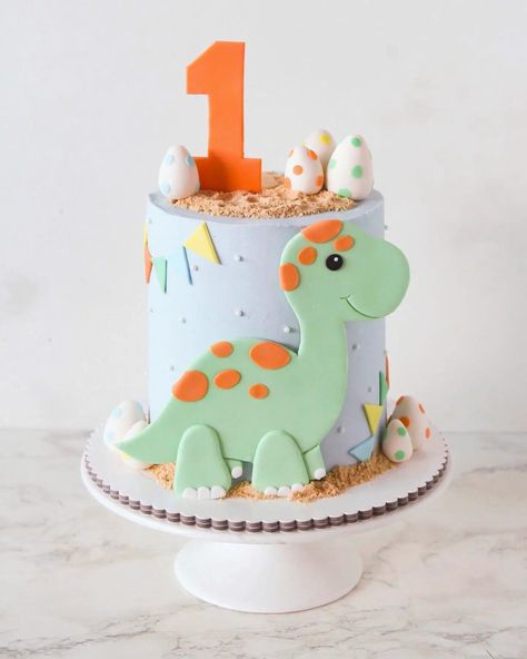 Cute Dinosaur Cake Ideas for Boys - A Pretty Celebration Dinosaur Cake For 1st Birthday, Dinosaur Birthday Cake One Year Old, Dino First Birthday Smash Cake, One Year Old Dinosaur Cake, Baby Dinosaur First Birthday Party, Dinosaur Cake First Birthday, Baby 1st Birthday Cake Boy, 1st Birthday Dinosaur Theme Cake, Birthday Cake Dinosaur Boys