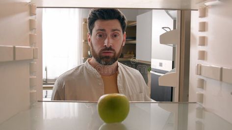 POV point of view from inside refrigerator Caucasian adult man at kitchen open empty fridge with one green apple fruit stock photography Fridge Photography, Empty Refrigerator, Fruit Advertisement, Inside Refrigerator, Empty Fridge, Hungry Man, Kitchen Open, Lettuce Leaves, Apple Fruit