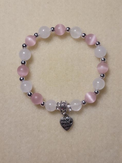 "Hand-made pink and white bracelet. Pink and white 8mm glass beads separated by silver spacers.  \"Made with Love\" charm added. Charm can be customized." Cute Cheap Bracelets, 8mm Beads Bracelets, Glass Beaded Bracelets Aesthetic, 8mm Bead Bracelet, Beaded Bracelets 8mm, Pink And White Beaded Bracelets, Pink And White Accessories, Bracelets Of Beads, Braslets Designs Beads