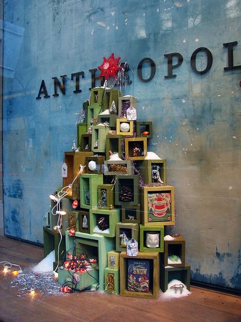 25 Creative Christmas Display Ideas & Examples Christmas Window Display Retail, Anthropologie Christmas Tree, Christmas Shop Displays, Christmas Store Displays, Window Display Ideas, Holiday Retail, Christmas Shop Window, Anthropologie Christmas, Holiday Window Display