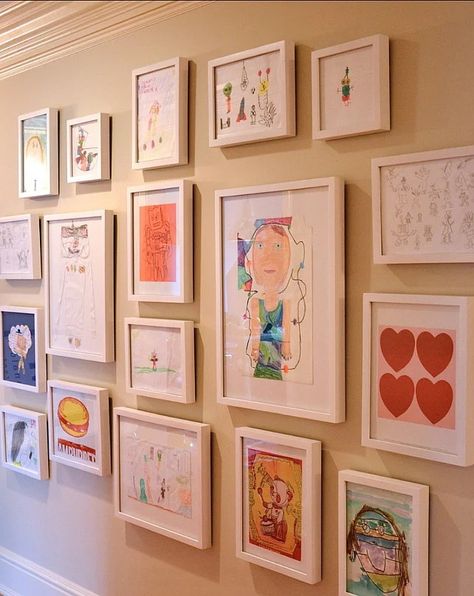 How to Display Kids' Art In Your Home Playroom Art Gallery, Playroom Art Display Wall, Kids Room Photowall, Kids Art Frame Display, How To Display School Pictures, Toddler Artwork Display, Kids Art Work Display Ideas, Kids Artwork Collage, Kids Wall Art Display