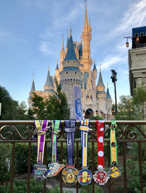 Medals with Castle after the runDisney Walt Disney World Marathon Weekend and Dopey Challenge Recap 2018 Dopey Challenge Medal Display, Disney Run, Disney Running Outfits, Disneyland Half Marathon, Walt Disney World Marathon, Disney Races, Disney Marathon, Run Disney Costumes, Princess Half Marathon