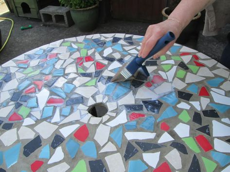 L.M.Reid Want Mosaic Table Top Designs, Penny Table Tops, Diy Mosaic Projects, Mosaic Outdoor Table, Mosaic Outdoor, Mosaic Patio Table, Metal Outdoor Table, Brick Border, Small Porch Decorating