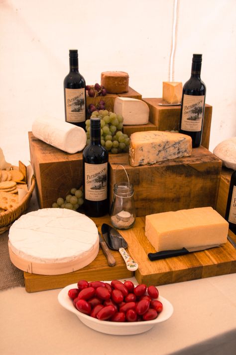 Cheese display on oak blocks Cheese Counter Display, Cheese Trolley, Charcuterie Shop, Cheese Station, Cheese Boutique, Food Setup, Buffet Setup, Elevated Food, Bread Display