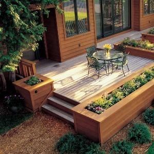 Build raised beds around the patio for a finished look. by elva Backyard Decks, Front Porch Flowers, Pergola Diy, Deck Planters, Patio Deck Designs, Front Yard Design, Deck Designs Backyard, Planter Ideas, Decks Backyard