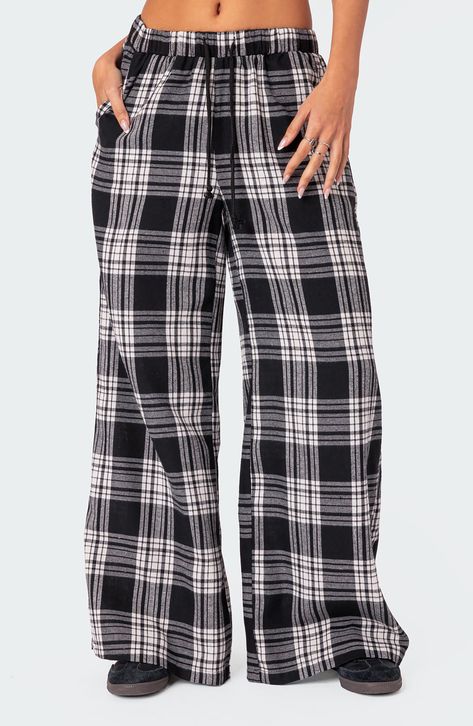 Lounging at home has never looked as good as it does in classic plaid pants cut in a breezy wide-leg silhouette with a comfortable drawstring waistband. Elastic/drawstring waist Front slant pockets 50% cotton, 50% polyester Machine wash, line dry Imported Fluffy Pj Pants, Pajama Pants Outfit, Pajama Pants Pattern, Plaid Wide Leg Pants, Black Pajama Pants, Pj Outfit, White Pajamas, Cute Pjs, Plaid Pajama Pants