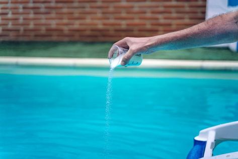 Bleach vs Chlorine For Your Pool: What's the Difference? | House Grail Coffee Stain Removal, Washing Towels, Hard Water Stain Remover, Cleaning Blinds, Pool Chlorine, Wash Clothes, Bathroom Sink Drain, Pool Sizes, Pool Chemicals