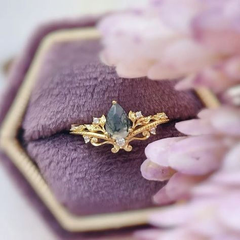 Azura Jewelry New York on Instagram: "Let the beauty of nature speaks to us through our Lotus Moss Agate Ring.🍃 A captivating aura we simply can't just resist. Tag a nature lover friend who will fancy this unique gemstone jewelry. 💫" Fairy Engagement Ring Gold, Moss Agate Engagement Ring Gold, Elven Wedding Ring, Whimsical Rings, Whimsical Wedding Ring, Whimsical Engagement Ring, Fairytale Engagement Rings, Elven Ring, Whimsical Ring