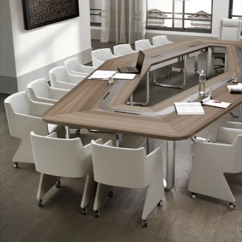 Whether you are hosting an executive board meeting or a creative workshop, the hexagonal shape of the Leader conference table offers the ideal solution. It is made of a panel of wood composite, veneered in eucalyptus essence; its central strip, covered in leather, incorporates ten retractable workstations.

#office #officesolution #officedesk #conferencetable #meetingdesk Conference Room Table Design, Office Cubicle Design, Office Reception Table Design, Conference Table Design, Meeting Table Office, Reception Table Design, Cubicle Design, Conference Room Design, Dining Room Design Luxury