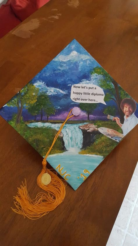 Graduation Mural Ideas, Graduation Cap Art Ideas, Paint On Graduation Cap, Hair Dos For Graduation Cap, Bachelor Of Arts Graduation Cap, Artsy Grad Cap Ideas, Bob Ross Graduation Cap, Paint Graduation Cap, The End Graduation Cap