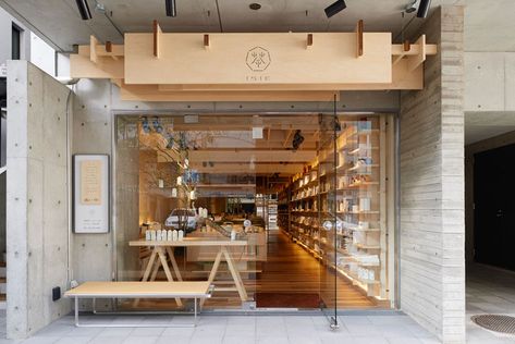 The wood sign with its small simple logo above this tea shop in Japan looks clean and natural against the concrete building it's attached to. Wellbeing Centre, Modern Japanese Architecture, Fast Casual Restaurant, Wood Logo, Casual Restaurants, Concrete Building, Wood Siding, Elegant Interiors, Tea Shop