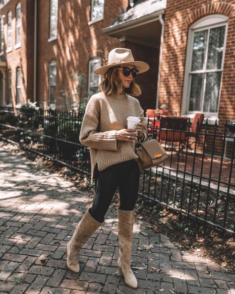 Karina Style Diaries wearing spanx faux leather leggings tan oversized sweater tall suede tan boots lack of color hat Tan Boots Outfit, Leather Leggings Casual, Business Chic Outfits, Suede Boots Outfit, Tall Boots Outfit, Leather Leggings Look, Karina Style, Leather Leggings Outfit, Fall Leggings