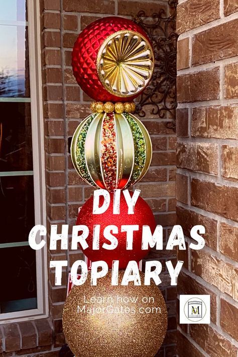 Diy Stacked Christmas Ornaments, How To Make Christmas Topiary, Ornament Topiary Diy Front Doors, Large Hanging Christmas Decorations, Christmas Topiary Outdoor Diy, Christmas Ornament Topiary Diy, Diy Christmas Topiary Front Doors, Diy Large Ornaments For Tree, Diy Yard Decor Christmas