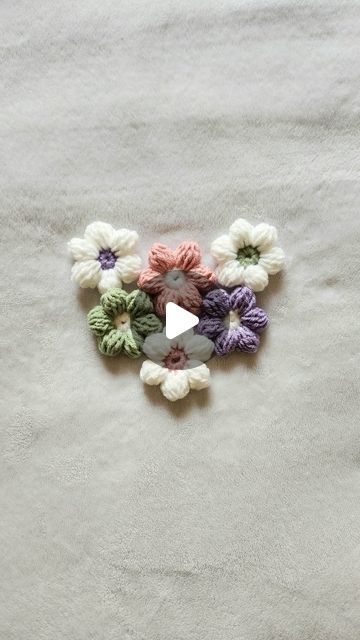 Jackie Visser’s Crochet on Instagram: "🌸Puff Crochet Flower🌸  I love these little puff flowers. 😍 There are so many things you can make with them. I've seen them used in bags, blankets, sweaters, headbands, and hats. What would you make using these? Whatever you decide to make these are on trend for summer 2024! 🌸🌼  #crochettutorial #crochetflower #crochettrends #summercrochet" How To Connect Crochet Puff Flowers, Crochet Bubble Flower Pattern, Flower Puff Crochet Bag, Puff Stitch Flower Crochet, Puff Flower Crochet Blanket, Crochet Puff Flowers Free Pattern, Puff Crochet Bag, Crochet Puff Flower Bag, Puffy Flower Crochet