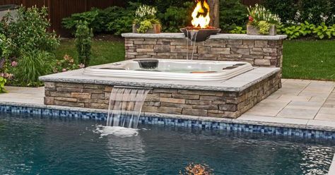 When Long Island Hot Tub’s client wanted to add a spa to his gunite pool -- one that would match his pool in style and materials -- we developed an attractive d… Solar Pool Heater Diy, Hot Tub Landscaping, Portable Hot Tub, Pool Remodel, Hot Tub Backyard, Portable Spa, Gunite Pool, Pool Noodle, Building A Pool